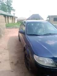 A picture of MAZDA 323f TOMORROW DEAL FOR SALE MANUAL GEAR ENGINE GOOD