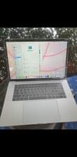 A picture of Mackbook pro 2018 touch bar mpyaa tsh 1 600 000