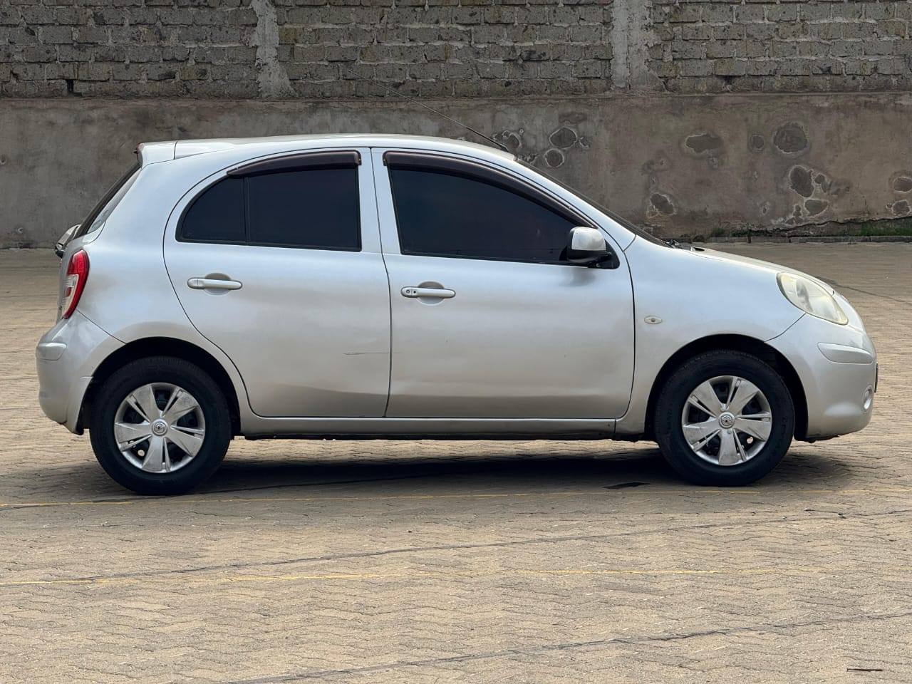 A picture of NISSAN MARCH 4 SALE ASKING PRICE 440K NEGOTIABLE CALL WHATSAPP