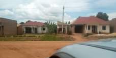 A picture of PLOT 50x50Ft ON QUICK SALE 3M located at matugga kiwebwa