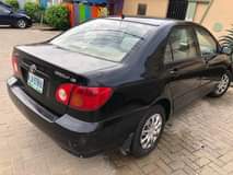 A picture of 2004 FEW MONTHS REGISTERED TOYOTA COROLLA LE FIRST PAN BODY