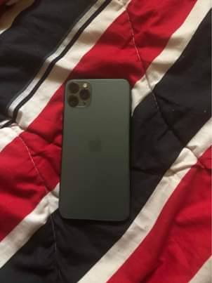 A picture of Iphone 11pro max 64gb with receipt dm me in interested