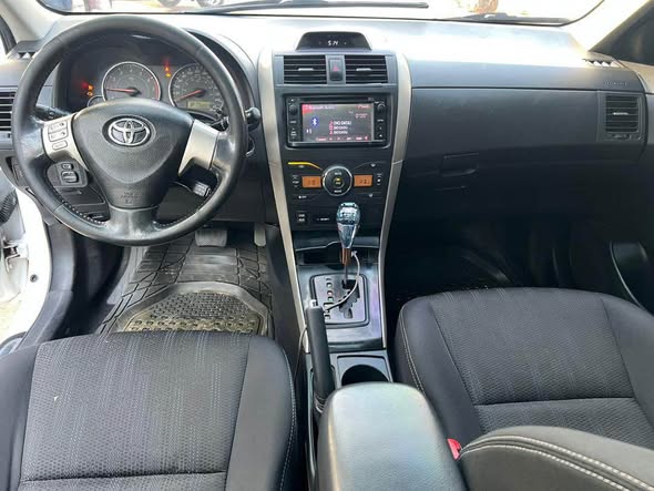 A picture of CLEAN USED TOYOTA COROLLA 2013 MODEL ORIGINAL PAPERS BATMAN ALLOY