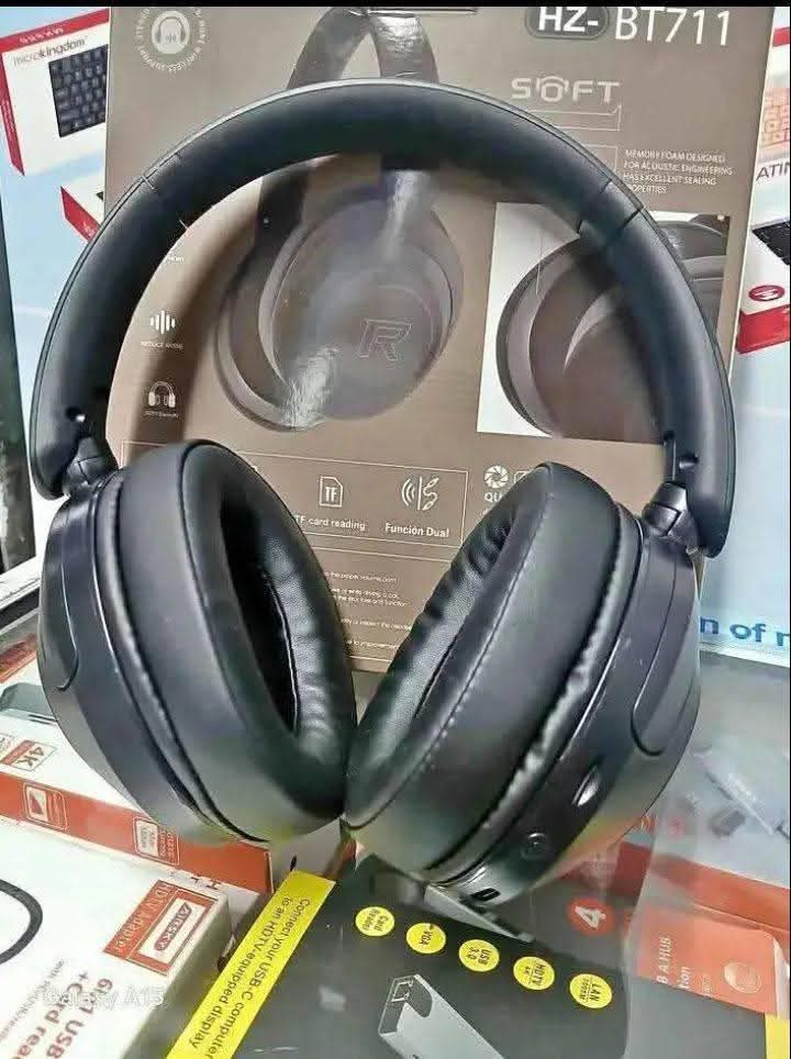 A picture of Laptop head phone and mini router