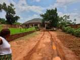 A picture of Wakiso Banda house with four boysquarters Having 5 beedrooms sitting