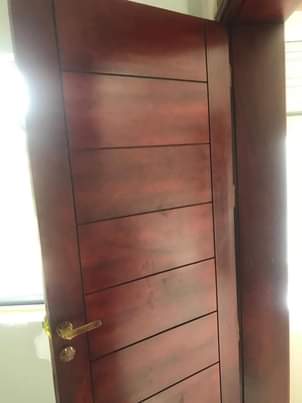 A picture of Mahogany doors wardrobes and kitchen cabinets
