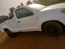 A picture of Toyota Hilux untouched chassis is available with good condition engine