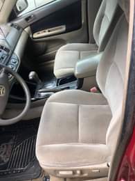 A picture of Toyota Camry 2004 4 plug Painted but not neatly Engine