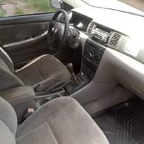 A picture of Corolla Engine and manual Gear working perfectly well Ac needs