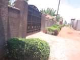 A picture of Quick sale 18 5m Plot located garuga on entebbe rd