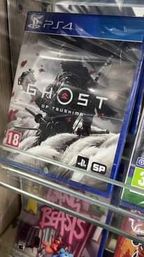 A picture of PS5 and PS4 Game CDs
