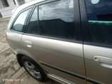 A picture of Mazda 323 neatly