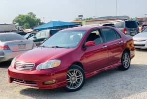 A picture of RED An Extremely Clean Used Toyota Corolla 2004 Model With