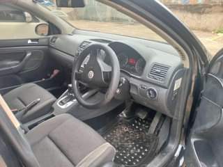 A picture of Golf GTI on..... sale in Kampala...... price....15m negotiable....UAZ.... number....... black