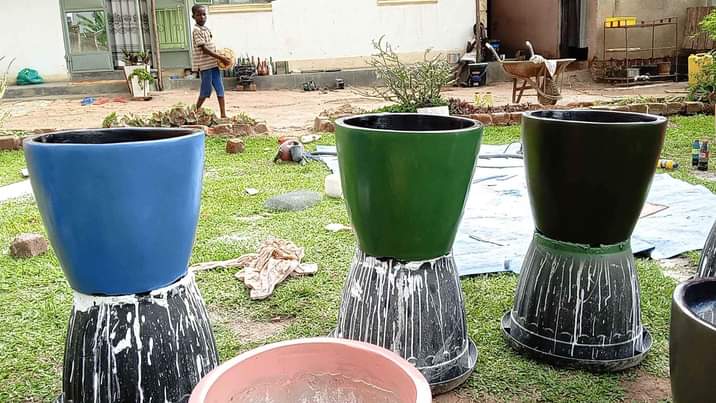 A picture of V shaped orchid xl ceramic finish cement pots