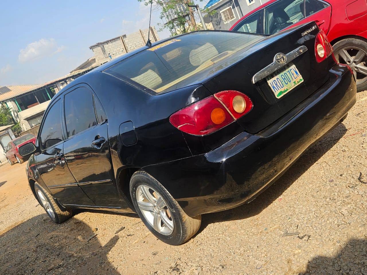 A picture of Mad Distress alert Toyota corolla 2004 with untampered engine and