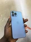 A picture of Original IPhone 13 pro max 256 gab storage 1 wk