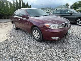 A picture of Toyota Camry 2004 Sound engine Perfect gear Cooling AC Neat