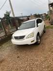 A picture of Extremely clean tokumbo standard registered white lexus rx330 with tesla