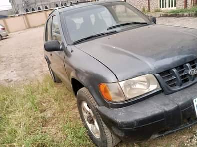 A picture of kia Sportage 02 flash on first body pan engine and