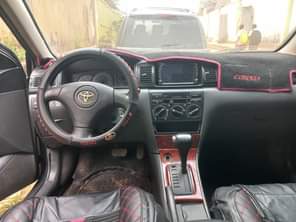 A picture of Toyota corrola 07 vvt i repainted on first body and