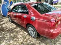 A picture of Toyota Corolla 2004 model with sound engine and gear Nothing
