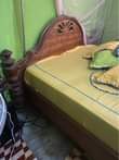 A picture of Kitanda mbao ngumu 5 6 Bei 145000 Bila godoro 0788053103