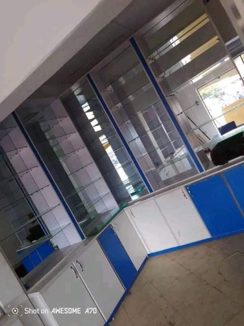 A picture of Kitchen cabinets and shoe rack
