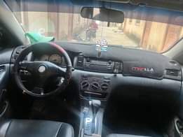 A picture of Belgium grade 2004 model toyota corolla With sound engine Smooth