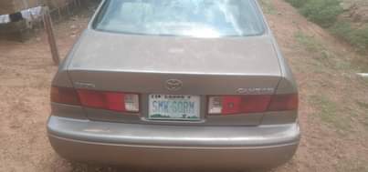 A picture of TOYOTA CAMRY ENVELOPE FIRST BODY PRICE 1 6 ENGINE GEAR
