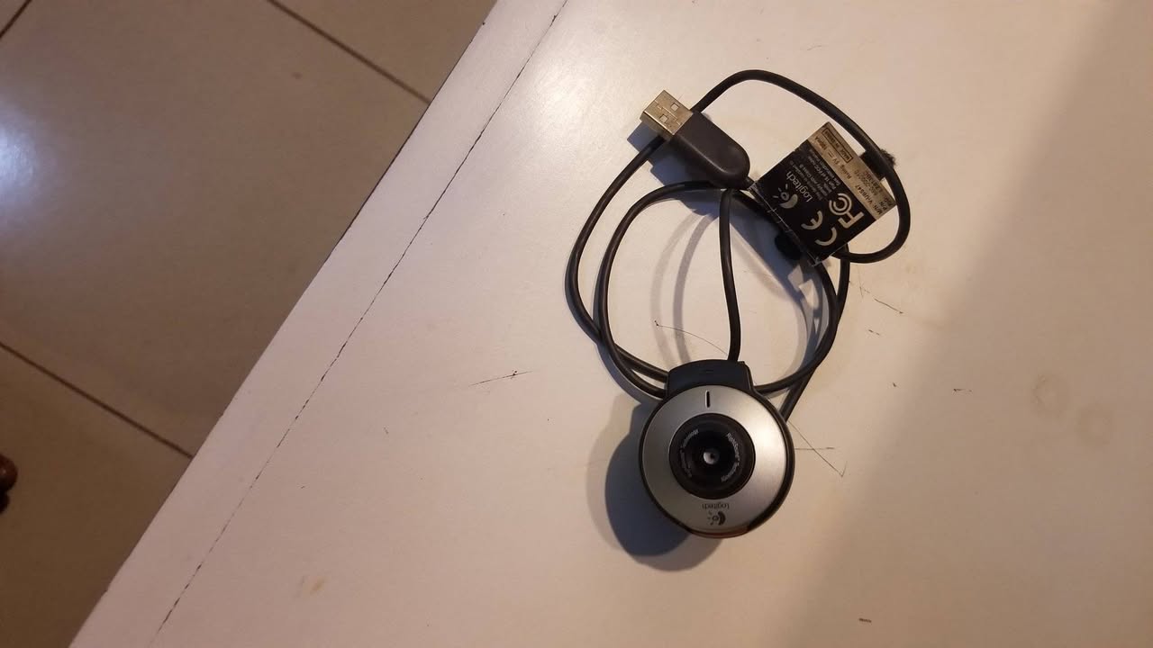 A picture of Computer microphone keyboard mouse and camera