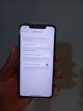 A picture of Iphone 11promax 64gig No condition... Location Lagos. WhatsApp 08116613146