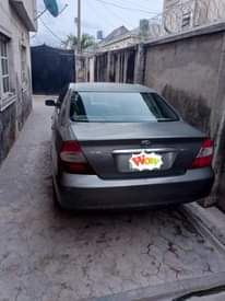 A picture of 2005 toy toyota camry first body only the bumber flashed