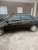 A picture of Bank corolla 2004 Everything is working 1 4 million Agent