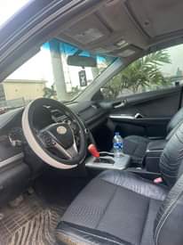 A picture of Very clean well maintained 2013 Toyota Camry Sport. Toks standard.