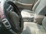 A picture of with 2 1m this 2004 toyota corolla with Partial 1st