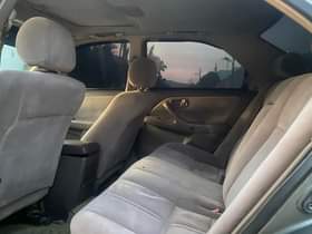 A picture of Super clean 2002 Toyota Camry in a pristine condition engine