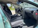 A picture of TORQUESE NIGERIAN USED PEUGEOT 407 2005 MODEL WITH ORIGINAL PAPERS