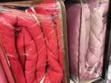 A picture of 3pc woolen blankets 2 pillow cases 1 blanket Sizes 4