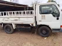 A picture of Nissan pickup is available with good condition engine Diesel everything