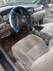 A picture of 2004 COROLLA painted on first body engine and gear AC