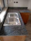 A picture of Marbles and granite slabs
