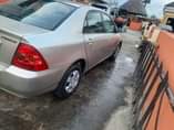 A picture of Sharp 2004 Toyota manual bank Corrolasound four plugs engine good