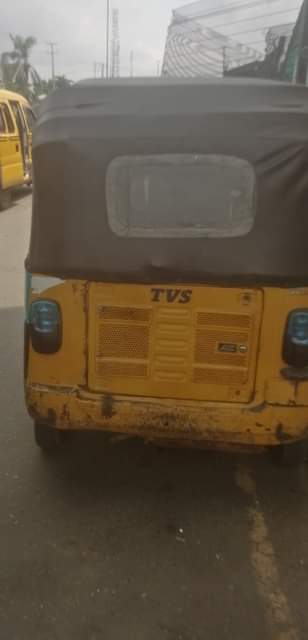 A picture of Tvs tricycle