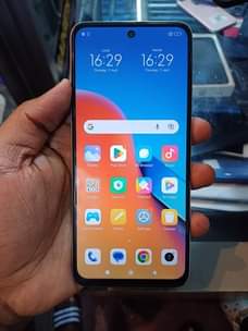 A picture of REDMI 12 256GB AT ONLY 570K...0708949918