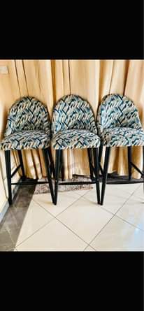 A picture of accent chairs and bar stools