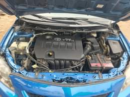 A picture of 2010 Corolla in super pristine condition repainted on first body