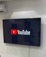 A picture of 410 000 last price for 32inch flat screen TV brand