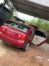 A picture of Toyota Corolla LE 03 04 Registered Painted once Cleans as