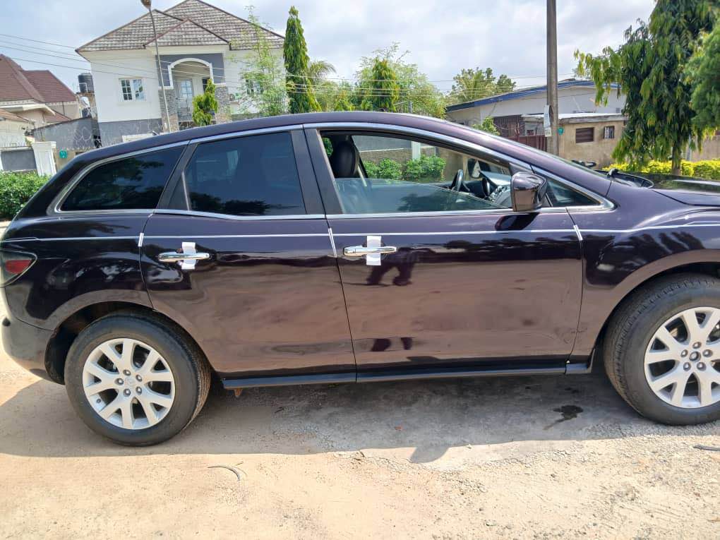 A picture of Distress Very sharp and clean Mazda CX9 clean in and